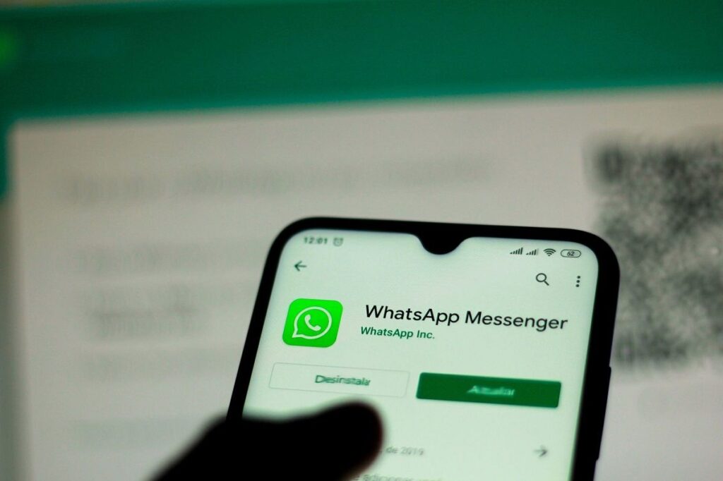 In this photo illustration the WhatsApp logo is seen